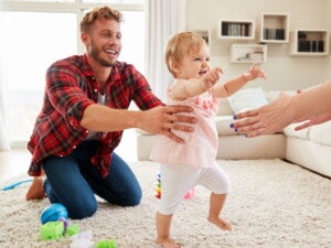 baby taking first steps