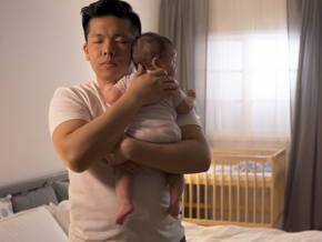 dad making baby sleep