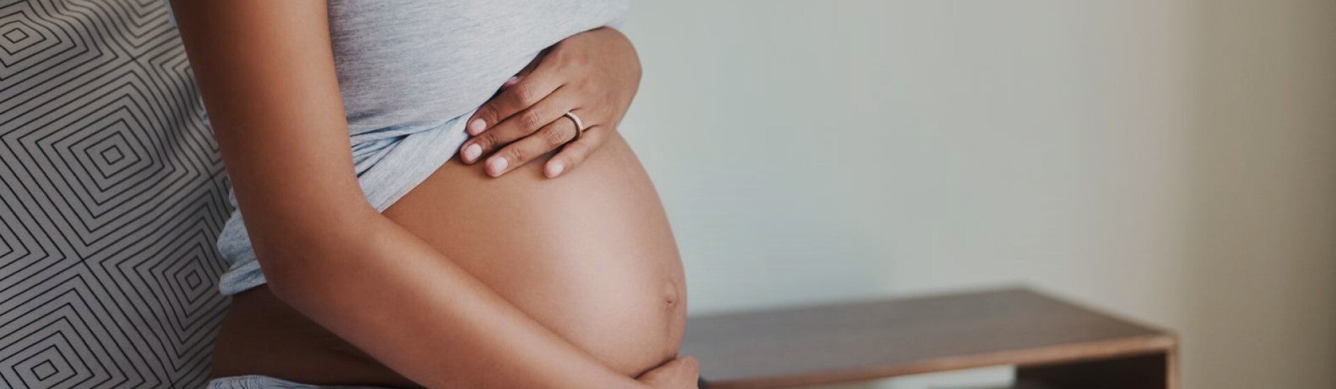 pregnant woman showing belly