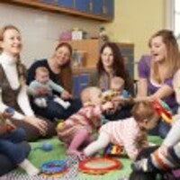 mothers talking at mothers group with babies